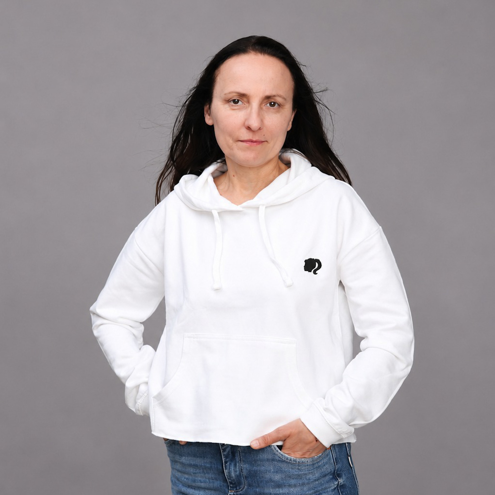 White hoodie with a small black chest print, custom printed for Dotee.art by Polska Drukarnia UK.